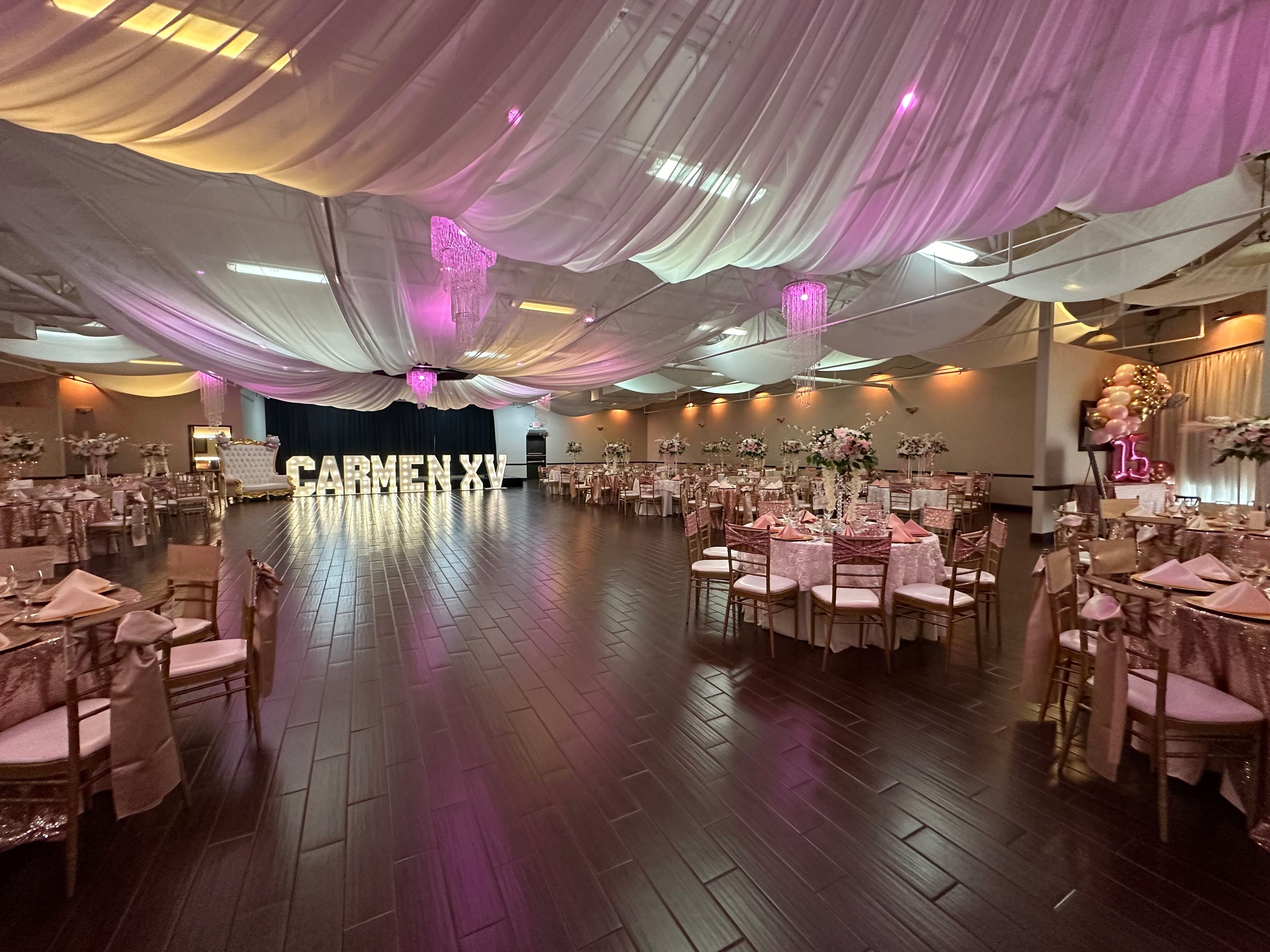 Elegant ballroom with dramatic uplighting